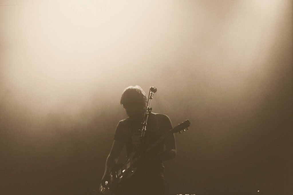 rock artiste playing guitar