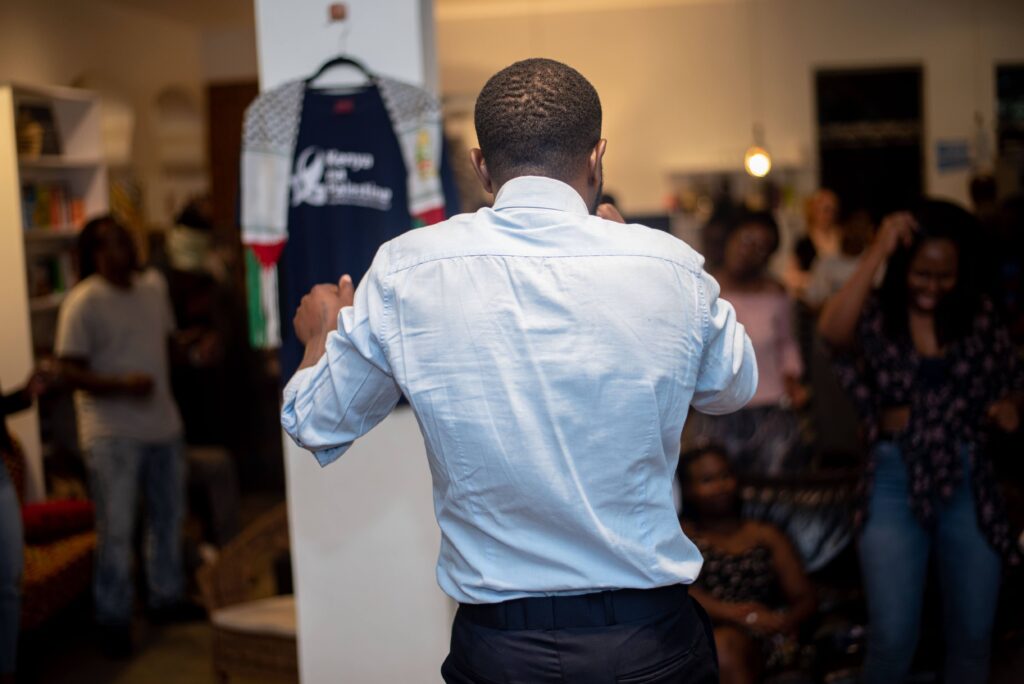 Mr Jemedari Kenyan musician dancing Cheche Bookshop